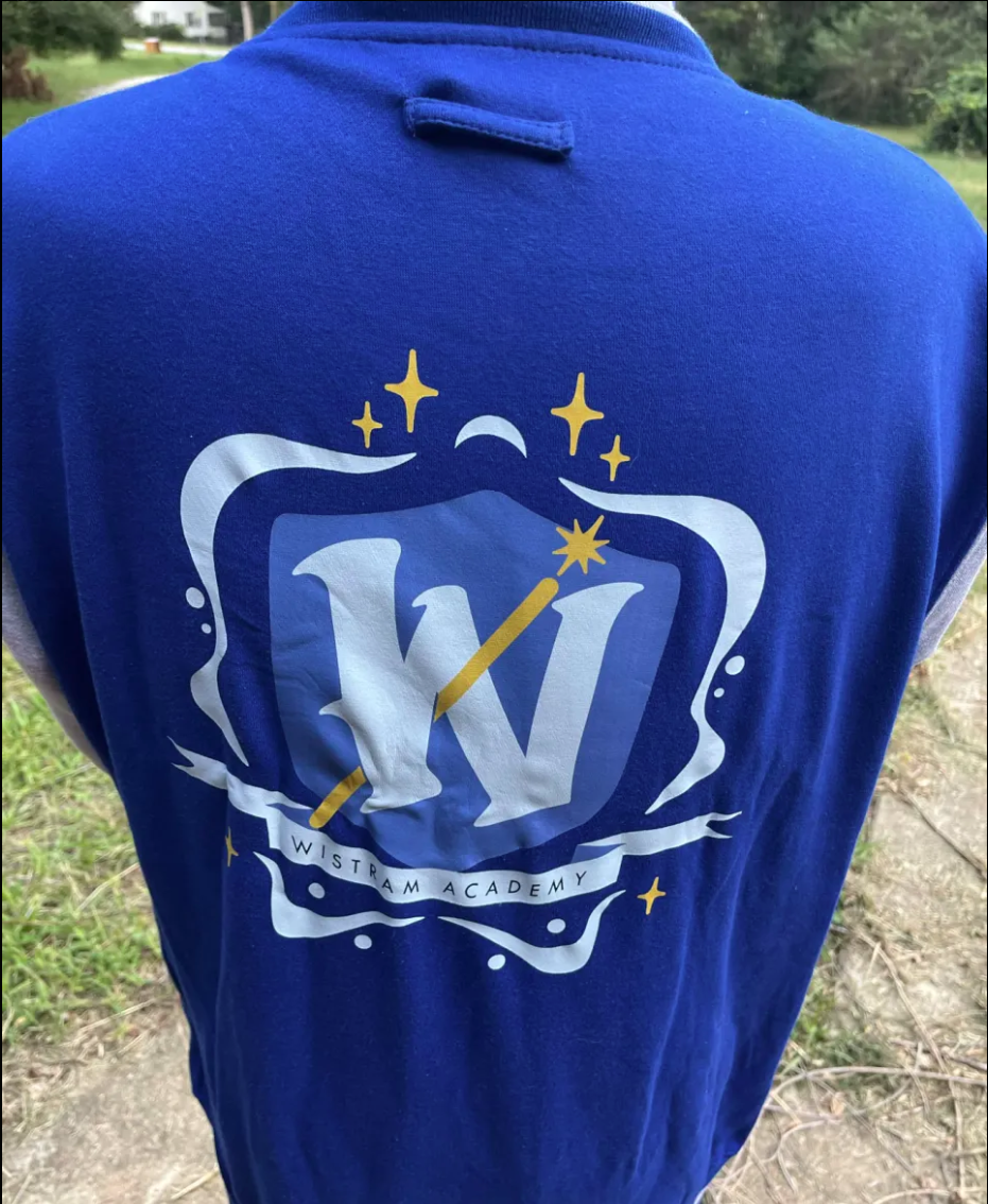Back of The Wandering Inn letterman jacket showing the Wistram Academy crest
